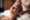 A woman getting a back massage at a spa created with Generative AI technology