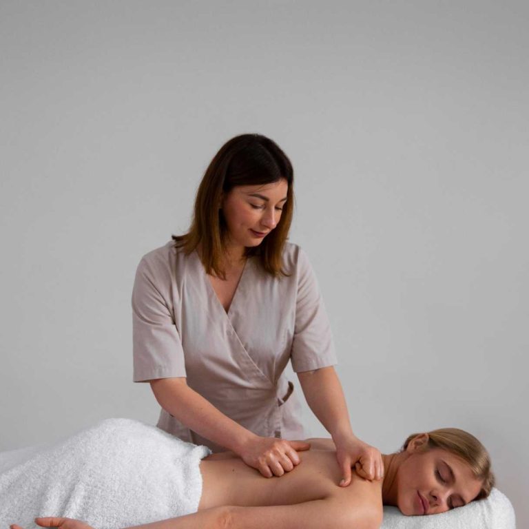 compressed_woman-getting-back-massage-from-masseur